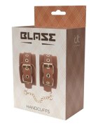 DREAM toys Cătușe Blaze Elite Handcuffs pentru jocuri erotice din piele ecologică cu lanț auriu culoare maro coniac