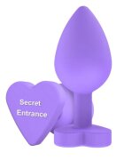 TOY JOY Plug anal Anal Play Booty Sweethearts cu mesaj „Secret Entrance” pe baza în formă de inimă diametru 3.5 cm mov