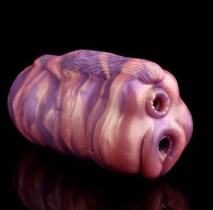 FAAK Masturbator Alien 2-Hole Silicon Lichid 15.5 cm