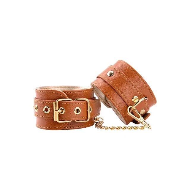 DREAM toys Cătușe Blaze Elite Handcuffs pentru jocuri erotice din piele ecologică cu lanț auriu culoare maro coniac