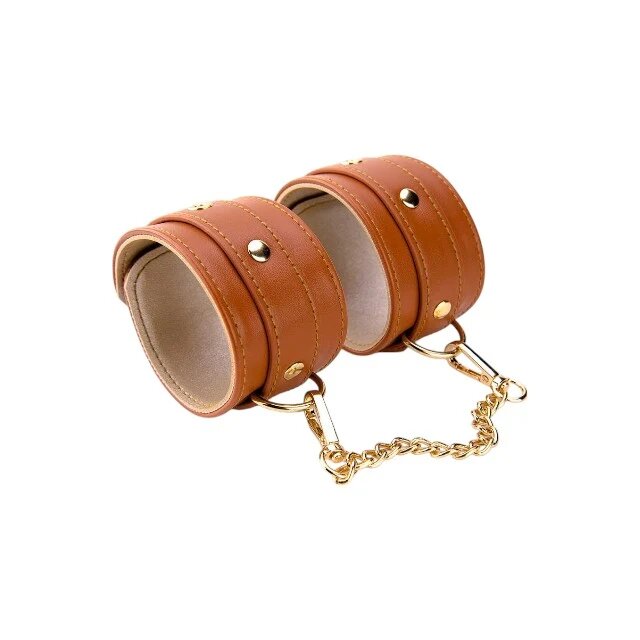 DREAM toys Cătușe Blaze Elite Handcuffs pentru jocuri erotice din piele ecologică cu lanț auriu culoare maro coniac
